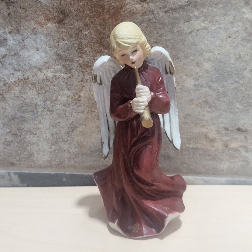 Bisque Porcelain Angel Figurine Playing a Gold Horn Trumpet